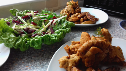 Turkey Nuggets, Potato wedges and foraged salad